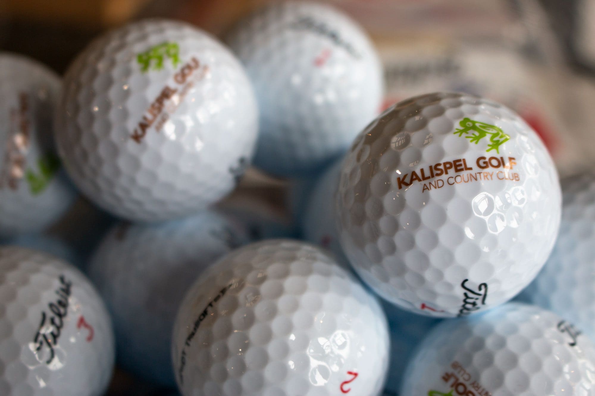 golf shop golf balls with Kalispel Golf and Country Club logo prominently displayed
